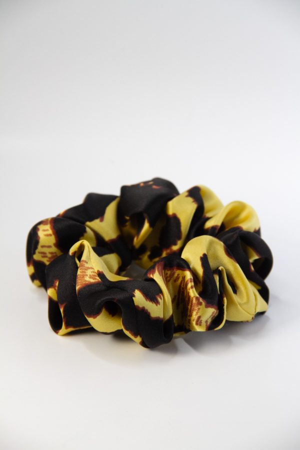 a scrunchie with yellow and black