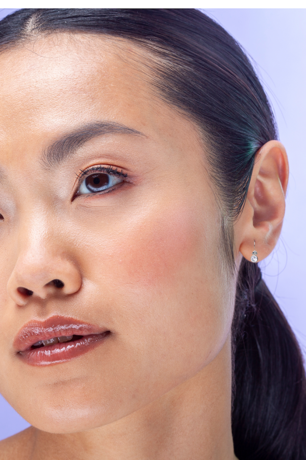 A model wearing crystal earrings